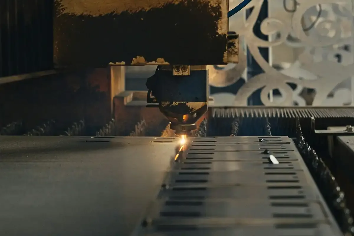 Machine using Coregas Industrial Grade Oxygen to cut a piece of metal.