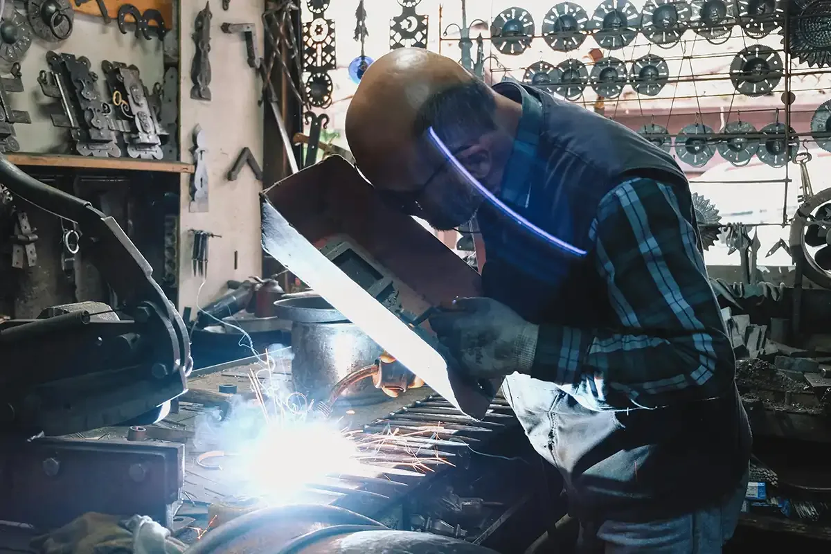 A welder using Coregas Industrial Grade Oxygen at work.