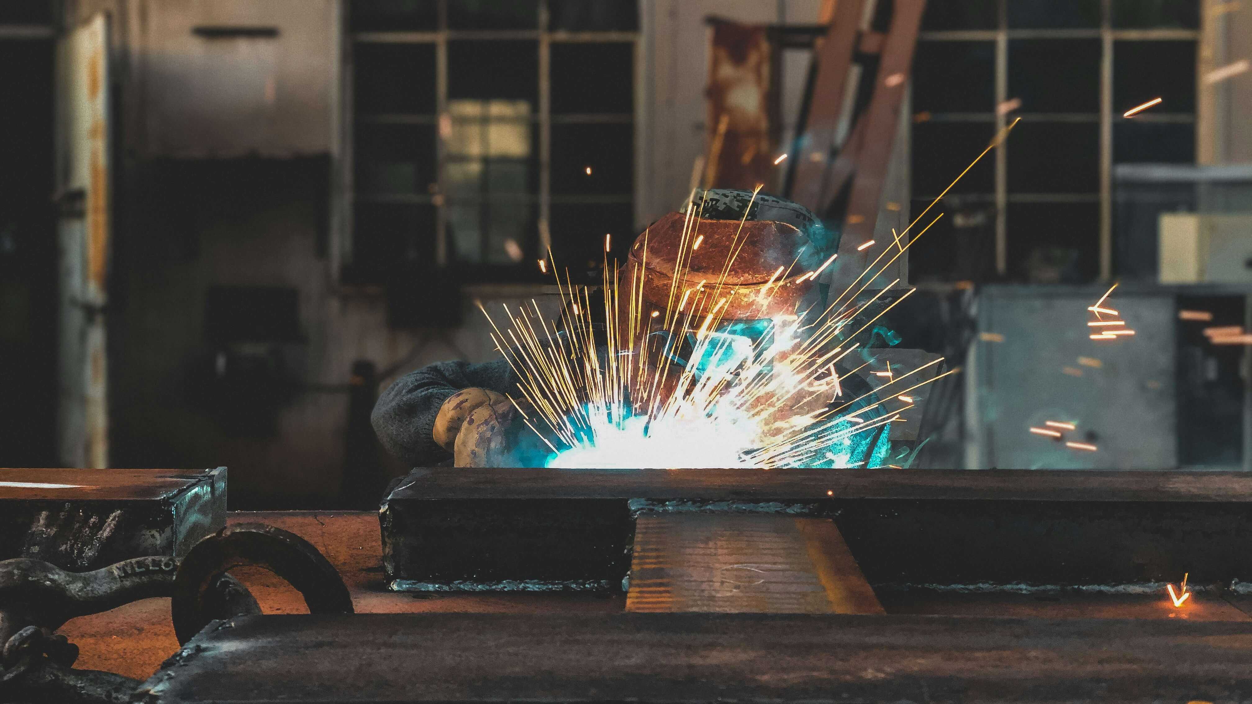 Welder preparing a joint after nitrogen purge to minimise oxygen and heat tint.